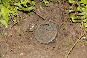 A photo released by the military shows the improvised land mine planted by NPA rebels in Surigao del Sur