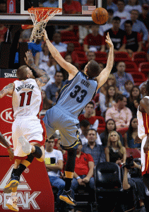 HOOK SHOT  Marc Gasol #33 of the Memphis Grizzlies shoots over Chris Andersen #11 of the Miami Heat during a game at American Airlines Arena in Miami, Florida. AFP PHOTO