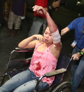 The pain after  A firecracker victim is wheeled into the Jose Reyes Memorial Medical Center in Manila, one of more than 300 revelers who were injured while welcoming the new year. Photo by Rene Dilan 