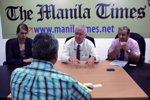 Free trade talks Swiss Ambassador Ivo Sieber (center) addresses a question raised by The Manila Times president and CEO Dante Ang 2nd (back to camera) during a roundtable with the Times’ editors. To Sieber’s right is Raoul Imbach, Counsellor and Deputy Head of Mission of the Embassy of Switzerland. Photo by Ruy Martinez