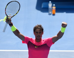 Spain's Rafael Nadal celebrates after victory in his men's singles match against Russia's Mikhail Youzhny  on day one of the 2015 Australian Open tennis tournament in Melbourne on Monday. AFP PHOTO 