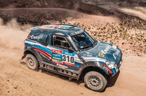 A MINI ALL4 car kicks up some dust during the Dakar Rally