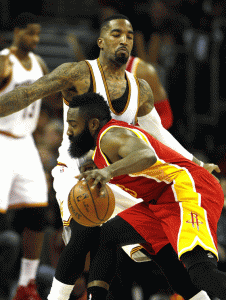 J.R. Smith No.5 of the Cleveland Cavaliers defends against James Harden no.13 of the Houston Rockets during the second half of their game at Quicken Loans Arena in Cleveland, Ohio. AFP PHOTO