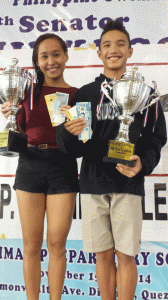 Loren Dale Echavez of University of San Carlos and Sean Terence Zamora of University of Santo Tomas hoist their PSL President’s Trophies. CONTRIBUTED PHOTO