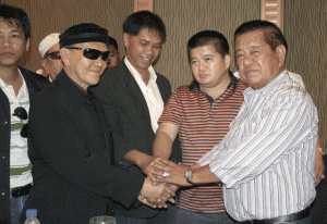 POLITICS  A photo released by the ARMM Bureau of Public Information shows Gov. Datu Zaldy Uy Ampatuan (2nd from right) of the Muslim autonomous region, and his father, former Maguindanao governor Datu Andal Ampatuan Sr. (extreme right). Both Ampatuans are in jail for the killing of 58 people including 35 journalists. With them are some supporters in 2009.