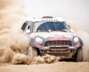 A Mini ALL4 Racing car kicks up dust during the 9th stage of the Dakar