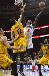 NO WAY! Tony Wroten (No. 8) of the Philadelphia 76ers makes a shot to give the 76ers the lead late in the fourth quarter with Joe Harris (No. 12) of the Cleveland Cavaliers defending on the play on Monday (Tuesday in Manila) at the Wells Fargo Center in Philadelphia, Pennsylvania. AFP PHOTO