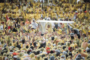 EMOTIONAL DAY Pope Francis waves to well wishers after a mass in Tacloban on Saturday. AFP PHOTO