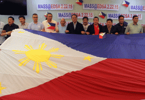 FOR FLAG AND COUNTRY  Members of a group called 2/22 Coalition, which seeks the ouster of President Benigno Aquino 3rd hold a giant Philippine flag which, according to them, is an expression of People Power.  Malacañang, however, has belittled the coalition, saying it lacks support from the public and the military. PHOTO BY MIKE DE JUAN