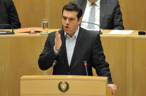 SEEKING ALLIES  Greece's new Prime Minister Alexis Tsipras addresses a special session of the Cypriot House of Representatives on Tuesday at the parliament in Nicosia. Tsipras is holding talks in Cyprus as he makes his first foreign visit to a close ally that has also been ravaged by the eurozone crisis. AFP PHOTO