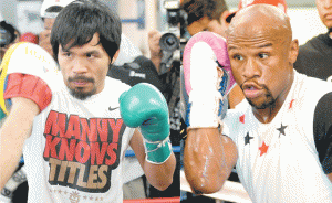 Manny Pacquiao (left) and Floyd Mayweather Jr. AFP PHOTOS