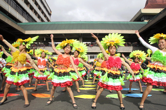 Children join a street dancing competition during the opening parade of the 20th Panagbenga Festival. The month-long festivities will be capped by a spectacular float parade on March 1 . Photo by  Thom Picaña