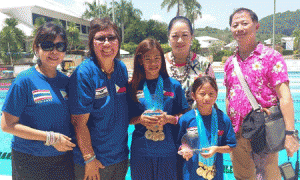 Kyla Soguilon and Aubrey Tom display their Most Outstanding Swimmer trophies with Philippine Swimming League President Susan Papa and Secretary General Maria Susan Benasa, former Senator Nikki Coseteng and FESSAP Secretary General Graham Lim. CONTRIBUTED PHOTO