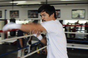 Manny Pacquiao performs a round of shadow boxing during training. AFP PHOTO