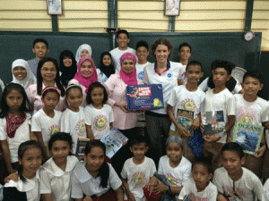 US government alumni read stories to elementary students in Jolo and encourage them to stay in school