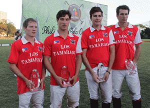 The members of Los Tamaraos hoist their trophies. CONTRIBUTED PHOTO