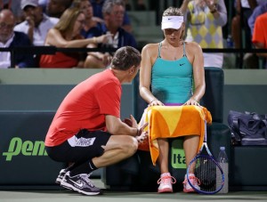  Maria Sharapova of Russia talks with her coach Sven Groeneveld during a match against Dania Gavrilova of Russia during Day 4 of the Miami Open in Key Biscayne, Florida.  AFP PHOTO 
