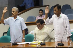 RELOCATION CENTER Edison Rivera (left) and Domino Arcilla (right) testify before the Senate blue ribbon sub-committee on Thursday on the allegedly failed Makati Home Ville project of the Makati city government in Laguna. The “unfinished” project was envisioned as a relocation center for the city’s informal settlers. PHOTO BY RUY L. MARTINEZ 