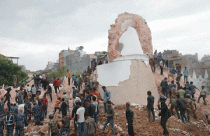 GREAT DESTRUCTION Nepalese rescue members gather at the collapsed Darahara Tower in Kathmandu on April 25, 2015. A powerful 7.9 magnitude earthquake struck Nepal, causing massive damage in the capital Kathmandu with strong tremors felt across neighboring countries. AFP PHOTO