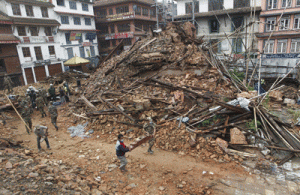 RESCUERS ARRIVE  This photo taken on April 28, 2015 shows rescuers looking for survivors in the rubble in earthquake-hit Kathmandu. The death toll from the April 25 7.8 magnitude earthquake on April 28 was more than 5,000, with another 8,000 people injured, while the United Nations estimated that eight million people had been affected. AFP PHOTO