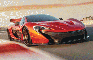 The McLaren P1 racing around the Bahrain circuit.