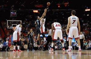 Hassan Whiteside No.21 of the Miami Heat and Nikola Vucevic No.9 of the Orlando Magic jump ball during a game at the American Airlines Arena on Tuesday in Miami, Florida. AFP PHOTO