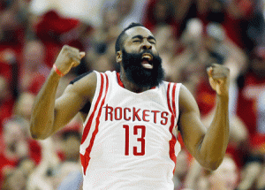 James Harden No.13 of the Houston Rockets celebrates a late basket against the Dallas Mavericks during Game Five in the Western Conference Quarterfinals of the 2015 NBA Playoffs at the Toyota Center in Houston, Texas. AFP PHOTO