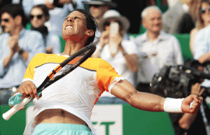 Spanish player Rafael Nadal celebrates after winning his match against Spanish player David Ferrer during the Monte-Carlo ATP Masters Series Tournament, on Saturday in Monaco. AFP PHOTO