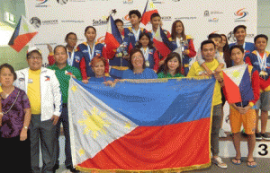 TRIUMPHANT TANKERS  Philippine Swimming League (PSL) President Susan Papa, Secretary General Maria Susan Benasa, Filipino Australian Club Inc. Founder and Vice President Vicki Wotherspoon and Filipino Community Council of Western Australia President Dante Maribbay with the Filipino community in Australia and the Filipino swimmers. CONTRIBUTED PHOTO