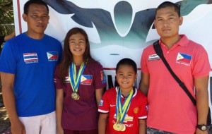 PROMISING TANKERS Kyla Soguilon of Aklan and Marc Bryan Dula of Susan Papa Swim Academy with coaches Manny de Leon and Marlon Dula. Soguilon and Dula show prowess by breaking the Philippine swimming records during the 74th PSL leg series dubbed as Capiztahan 2015 in Roxas City. CONTRIBUTED PHOTO