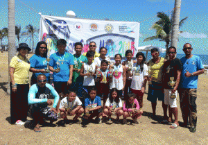 Philippine Swimming League (PSL) Secretary General Maria Susan Benasa, coaches Oliver Dela Cruz, Manny de Leon and Gina Loy with the Most Outstanding Swimmer awardees in the 74th PSL Leg Series dubbed as the 2015 Capiztahan Swim Meet in Roxas City. CONTRIBUTED PHOTO