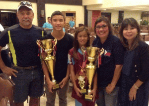 (From left) Finis-Philippines official Vince Garcia, Swimmers of the Year Sean Terence Zamora and Kyla Soguilon, and Philippine Swimming League President Susan Papa and Secretary General Maria Susan Benasa. CONTRIBUTED PHOTO