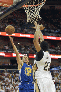 Stephen Curry No. 30 of the Golden State Warriors drives to the basket against Anthony Davis No. 23 of the New Orleans Pelicans during Game 4 in the first round of the 2015 NBA Playoffs at the Smoothie King Center in New Orleans, Louisiana. AFP PHOTO