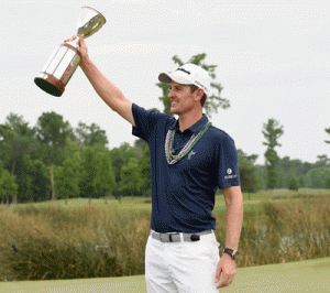 Justin Rose of England poses with the trophy after winning the Zurich Classic of New Orleans at TPC Louisiana in Avondale, Louisiana. AFP PHOTO