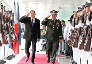 BON VOYAGE President Benigno Aquino 3rd and Armed Forces Chief of Staff Gen. Gregorio Pio Catapang Jr. review honor guards during a send-off ceremony at the Ninoy Aquino International Airport  on Wednesday. The President will be on a working visit to the United States and a state visit to Canada. MALACAÑANG PHOTO 