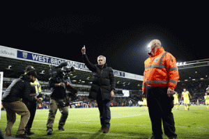 Chelsea’s Portuguese manager Jose Mourinho gestures to the fans after the final whistle during the English Premier League football match between West Bromwich Albion and Chelsea at The Hawthorns in West Bromwich, central England. AFP PHOTO