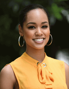 Miss Japan Ariana Miyamoto smiles during an exclusive interview with AFP in Tokyo on May 7, 2015. Miyamoto entered the Miss Universe Japan beauty contest after a multi-racial friend committed suicide. And she endured abuse after winning the crown because of her skin color. AFP PHOTO