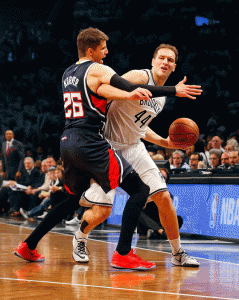 Brooklyn, New York: Kyle Korver No.26 of the Atlanta Hawks defends against Bojan Bogdanovic No.44 of the Brooklyn Nets in the first half of game six in the first round of the 2015 NBA Playoffs at Barclays Center in the Brooklyn borough of New York City.  AFP PHOTO