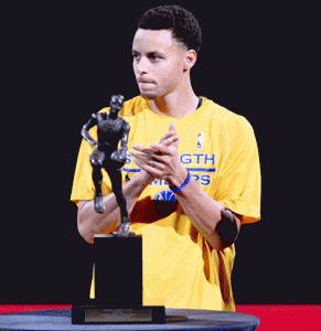 MVP  Stephen Curry No.30 of the Golden State Warriors is presented with the 2014-2015 Kia NBA Most Valuable Player Trophy prior to the start of Game Two of the Western Conference Semifinals of the NBA Playoffs against the Memphis Grizzlies at ORACLE Arena in Oakland, California. AFP PHOTO