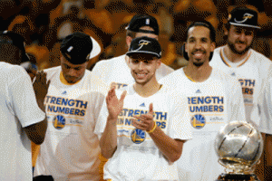 Members of the Golden State Warriors celebrate the 104-90 victory against the Houston Rockets during game five of the Western Conference Finals of the 2015 NBA Playoffs at ORACLE Arena in Oakland, California. AFP PHOTO