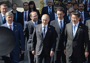 GREAT FRIENDSHIP  Russian President Vladimir Putin (C), Chinese President Xi Jinping (R) and Kyrgyz President Almazbek Atambayev (L) arrive to attend the Victory Day military parade at Moscow’s Red Square on May 9, 2015. Putin presides over a huge Victory Day parade celebrating the 70th anniversary of the Soviet win over Nazi Germany, amid a Western boycott of the festivities over the Ukraine crisis. AFP PHOTO