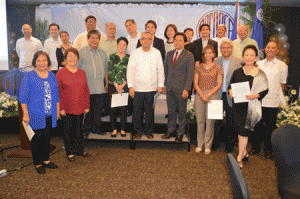 READY FOR TRANSITION  Officers and members of the Coordinating Council of Private Educational Associations pose for a group memento during the turnover ceremony of Cocopea chairmanship on Friday at Oakwood Premier in Pasig City