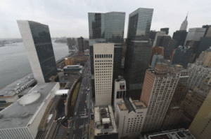 A view of First Ave. and the United Nations from inside the luxury high rise at 50 UN Plaza April 3, 2015 in New York. New York, a city of exorbitant rents with more and more single residents, is about to get a brand new type of apartment: micro-units, for decades prohibited under zoning regulations. AFP PHOTO/