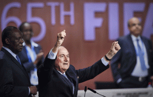 FIFA President Sepp Blatter gestures after being re-elected following a vote to decide on the FIFA presidency in Zurich Saturday. Sepp Blatter won the FIFA presidency for a fifth time after his challenger Prince Ali bin al Hussein withdrew just before a scheduled second round.