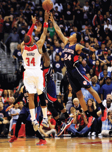 GAME WINNING SHOT  Paul Pierce #34 of the Washington Wizards puts up the game shot over Kent Bazemore #24 of the Atlanta Hawks to the give the Wizards a 103-101 win in Game Three of the Eastern Conference Semifinals of the 2015 NBA Playoffs at Verizon Center in Washington, DC.  AFP PHOTO