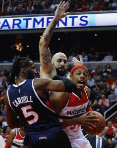 Paul Pierce No. 34 of the Washington Wizards looks for a shot against DeMarre Carroll No. 5 of the Atlanta Hawks during the first quarter at Verizon Center in Washington, DC. AFP PHOTO