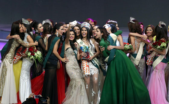 Candidates who vied for the Miss Earth Philippines title mob the winners of the pageant with one group crowding around title-winner Angelia Gabrena Ong of Manila for an obligatory selfie. PHOTO BY RENE H. DILAN