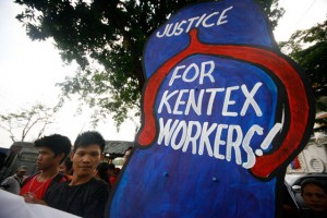 UNDER FIRE  Families and relatives of victims of a deadly fire at Kentex footwear factory in Valenzuela City (Metro Manila), along with some survivors, troop to the Office of the Ombudsman in Quezon City on Monday to file charges against Secretary Rosalinda Baldoz of the Departmentof Labor and Employment and other DOLE officials over the incident that left 72 factory workers dead last May 13. PHOTO BY MIGUEL DE GUZMAN 