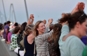 Thousands of people hold hands to form a human chain on The Arthur Ravenel Jr. Bridge in Charleston, South Carolina on Sunday (Monday in Manila). Thousands marched in Charleston where nine African Americans were gunned down, as a chilling website apparently created by the suspected white supremacist shooter emerged. AFP