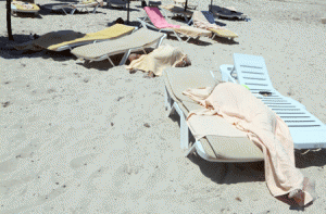 BEACH TRAGEDY Covered bodies of victims of a massshooting are seen in the resort town of Sousse, a popular tourist destination south of the Tunisian capital, following the attack. At least 38 people, including foreigners, were killed in a mass shooting at a Tunisian beach resort packed with holidaymakers, in the North African country’s worst attack in recent history. AFP PHOTO